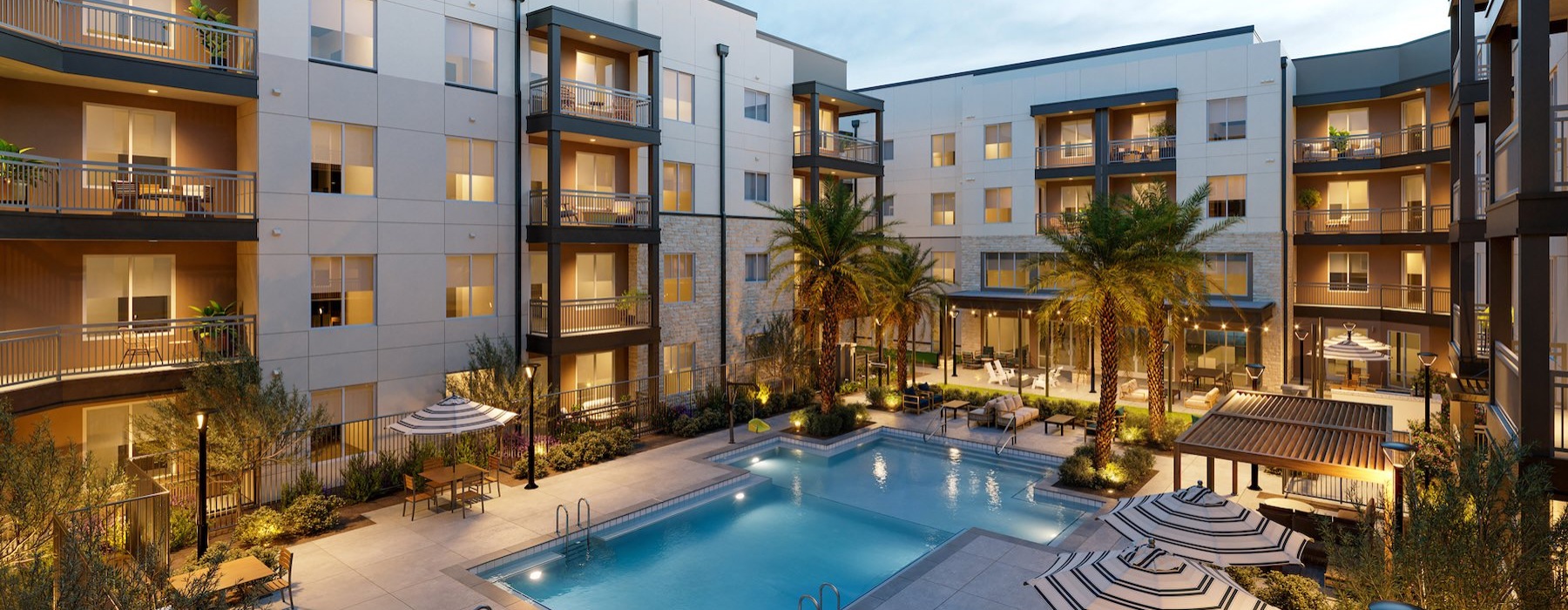 Resort-style swimming pool with lounge seating