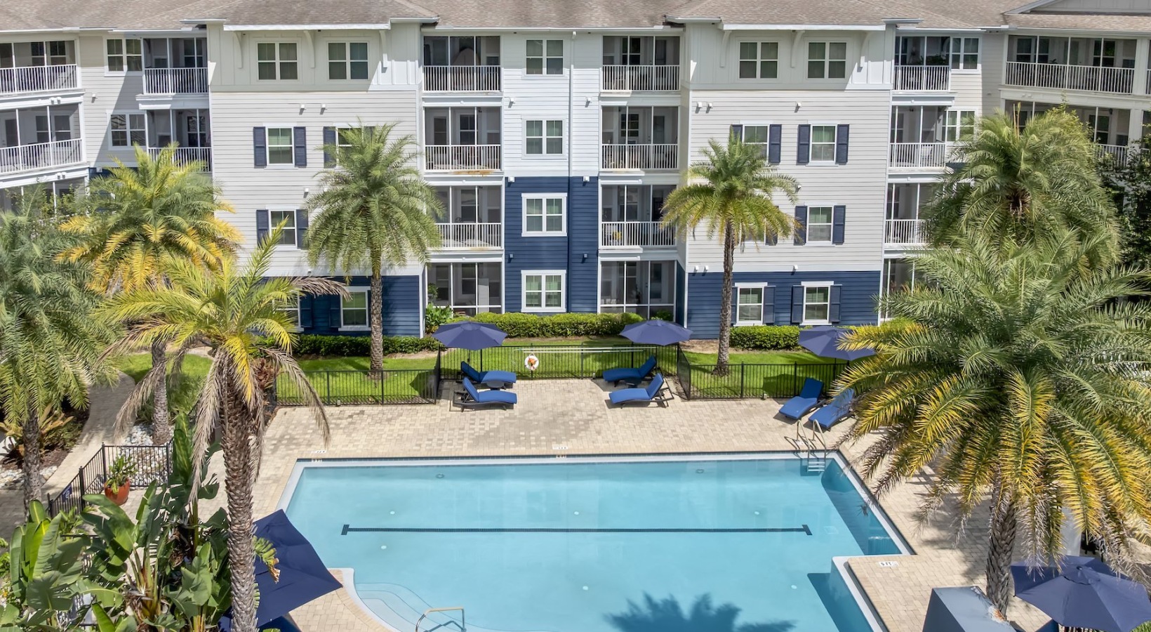 State-of-the-art amenities Resort-style swimming pool with lounge seating
