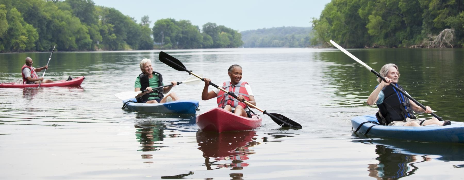 a group of people in kayaks