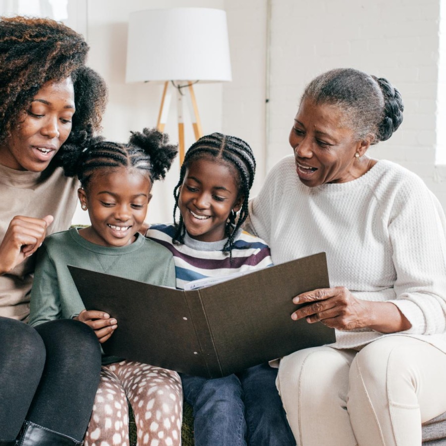 The essence of exceptional living a family sitting on a couch