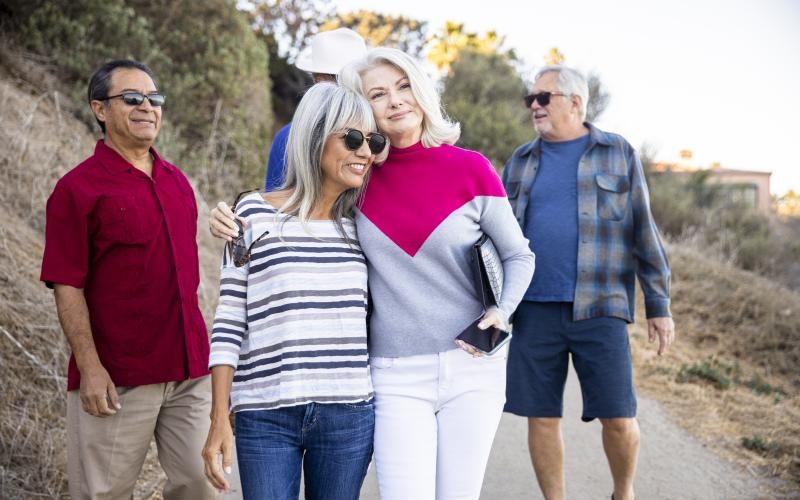 a group of people standing together outside