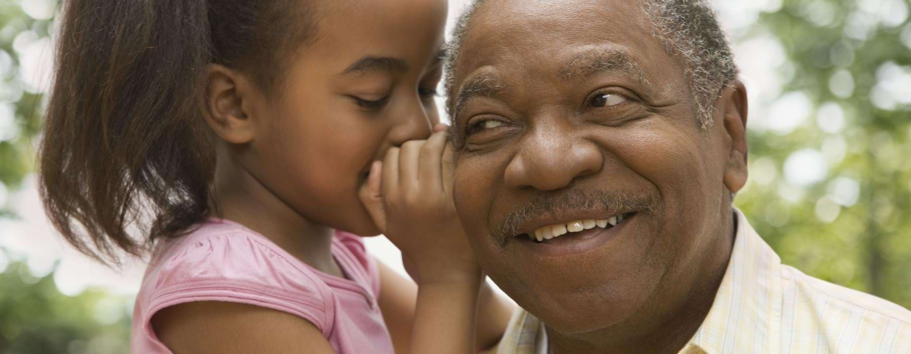a man listening to a child