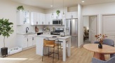 kitchen with stainless steel appliances and white cabinets