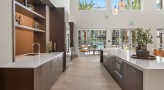 a spacious resident lounge and kitchen area