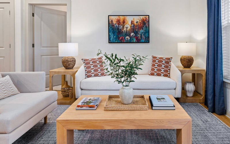 living room with couch table and picture on the wall