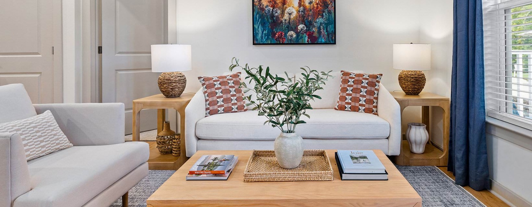 living room with couch table and picture on the wall