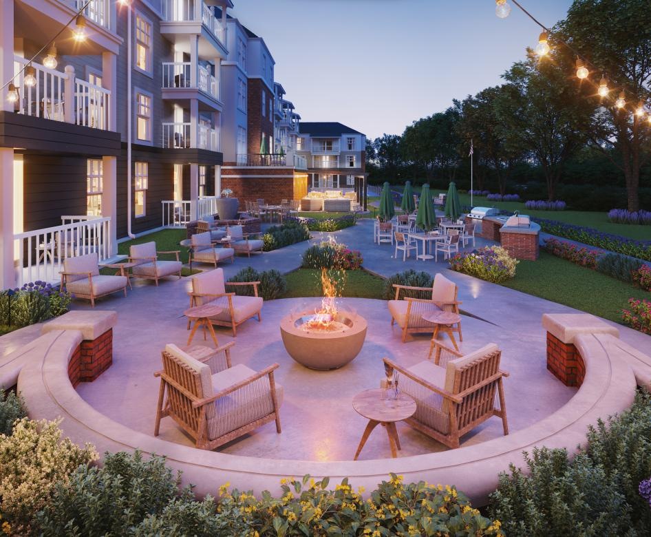 a courtyard with tables and chairs
