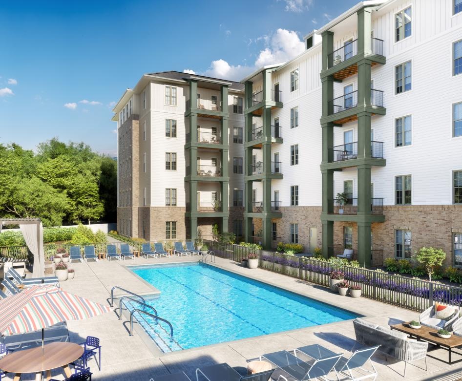 a swimming pool in front of a building