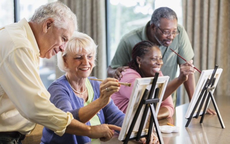Find your perfect fit at Album Indian Lake a group of people painting
