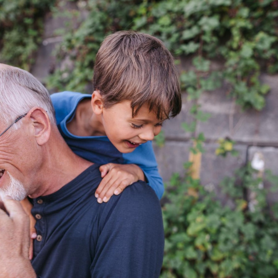 a man holding a child