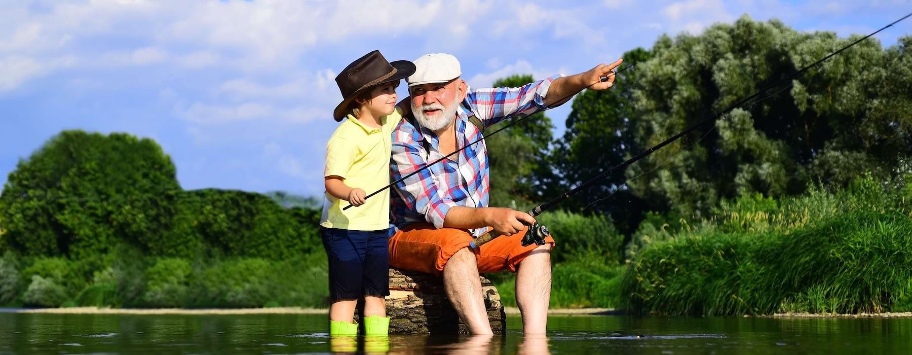 a grandpa and grandson fishing