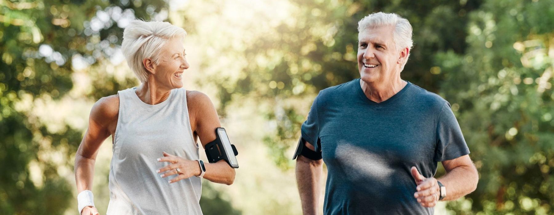a man and a woman jogging outdoors
