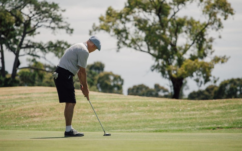 a man playing golf