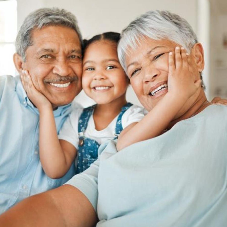 Settle into comfort at Album Indian Lake a family smiling and hugging
