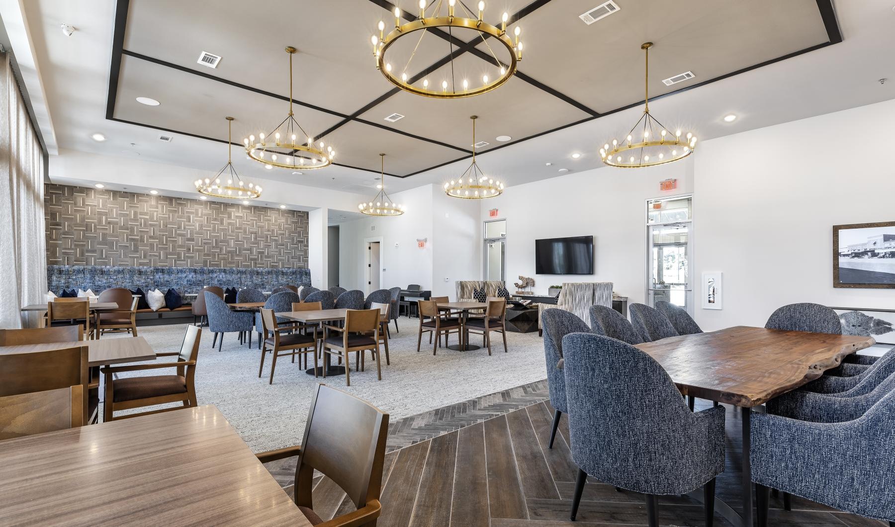 Find your perfect fit at Album Mansfield a large room with tables and chairs