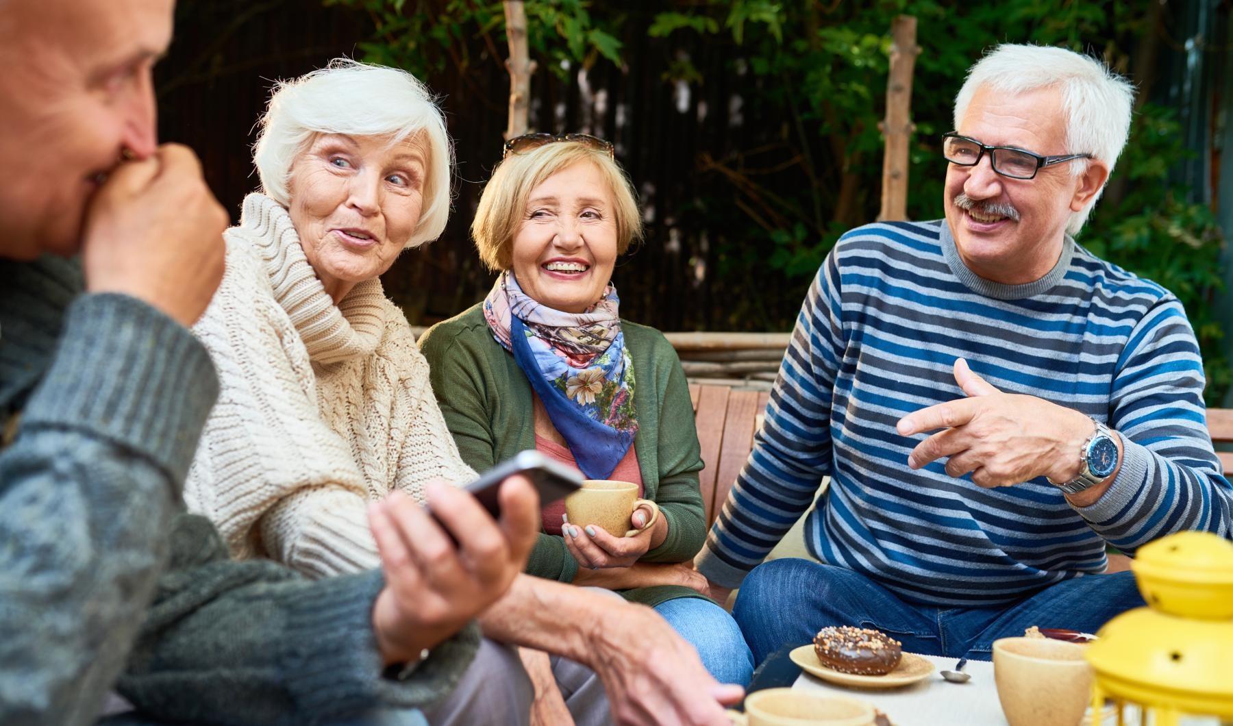 a group of people sitting outside