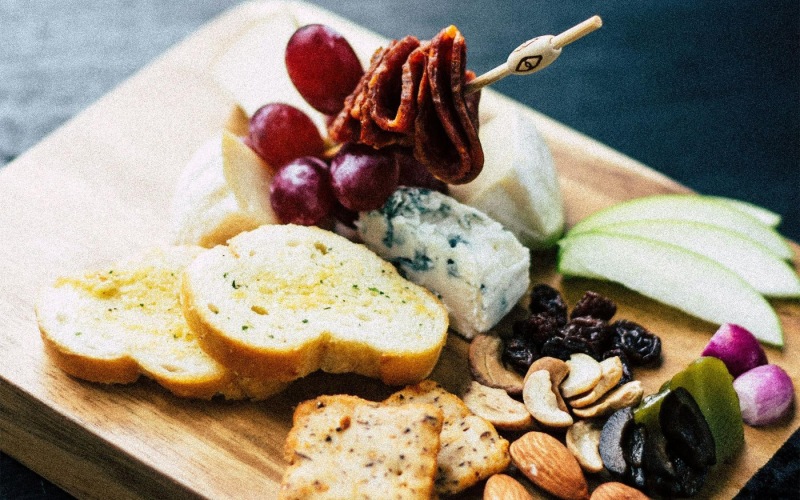 a plate of food, charcuterie board