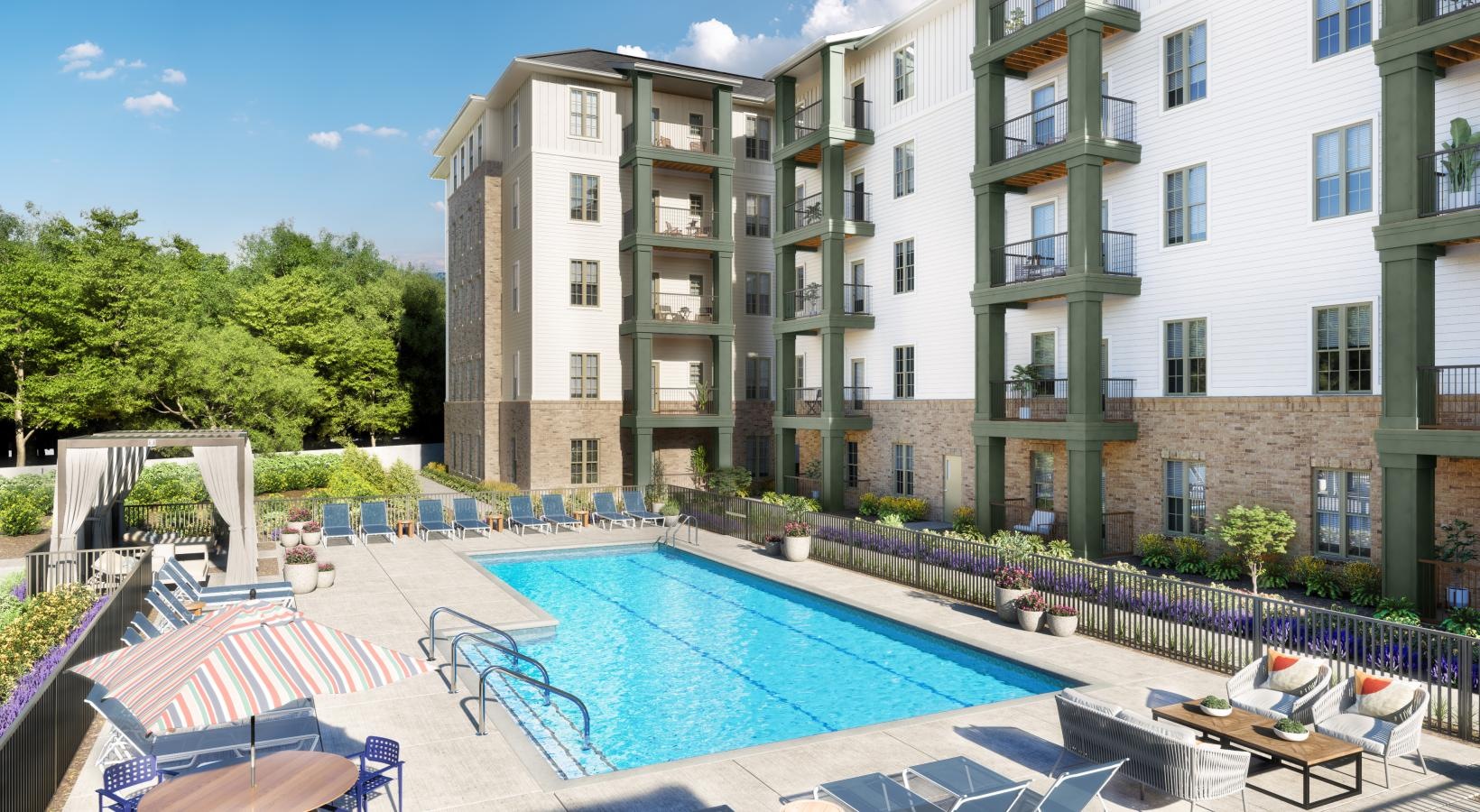 a swimming pool in front of a building