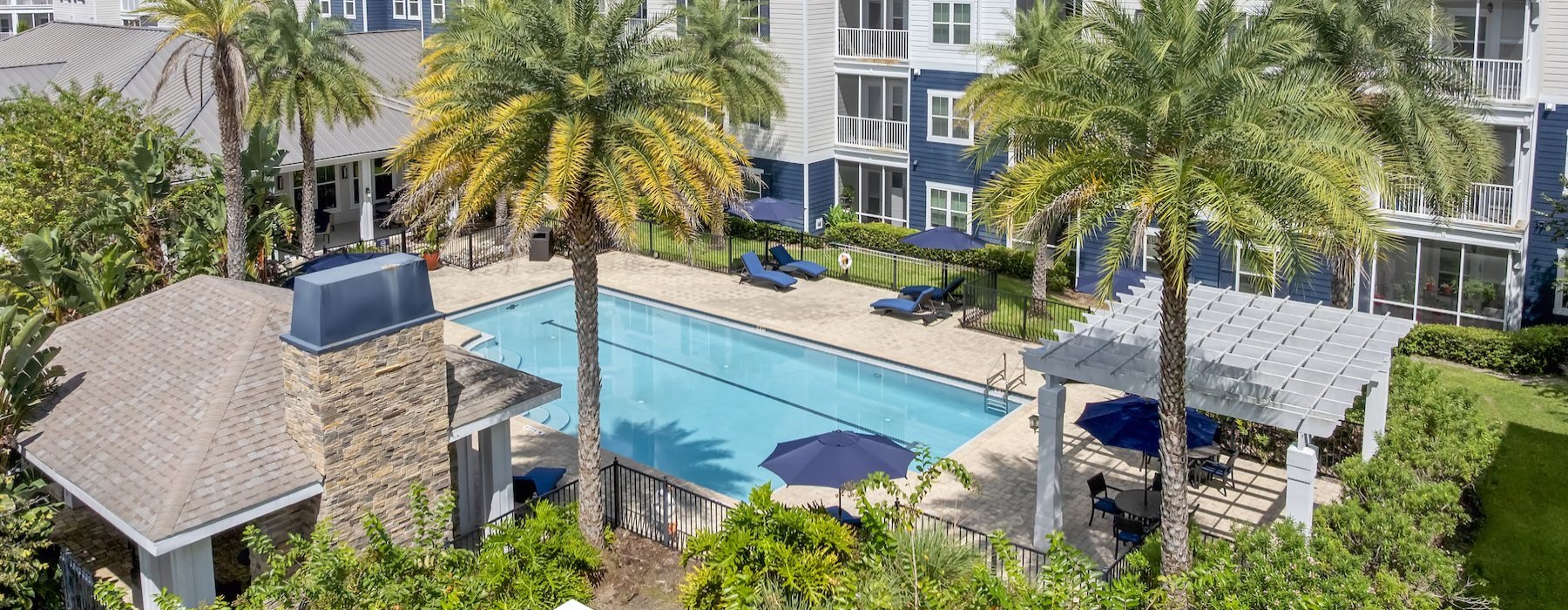 State-of-the-art-amenities Resort-style swimming pool with lounge seating