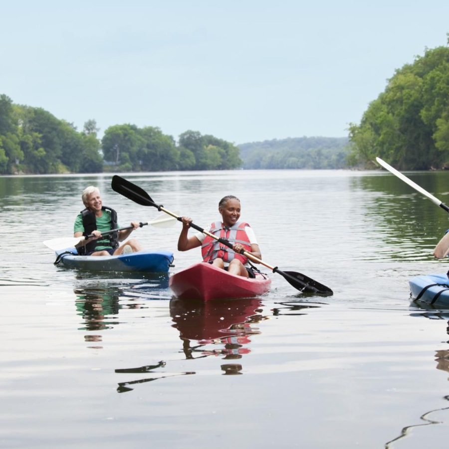 A beautiful community at the heart of all your passions a group of people in kayaks