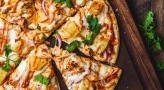 a pizza with cheese and vegetables