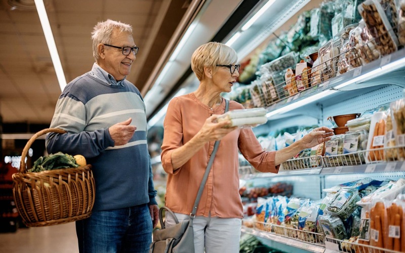 Find your perfect fit at Album Indian Lake a man and woman grocery shopping