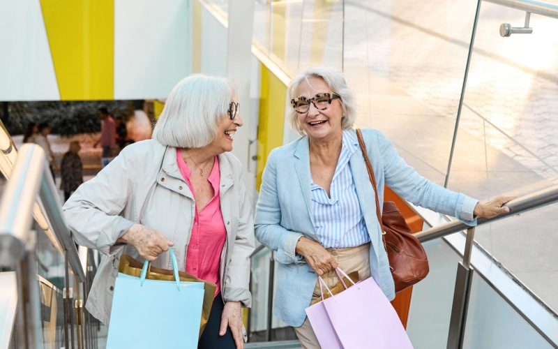 a couple of women walking up a flight of stairs