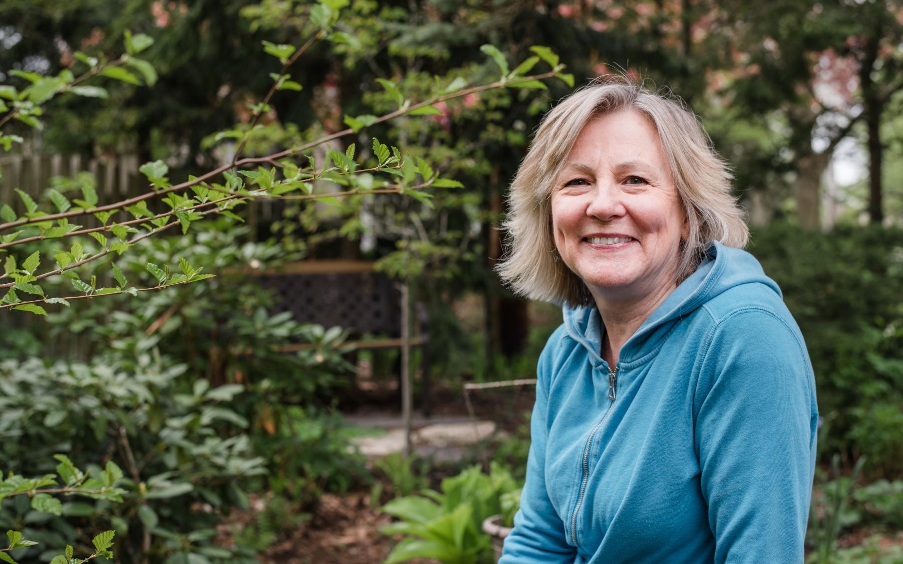 a person standing in a garden